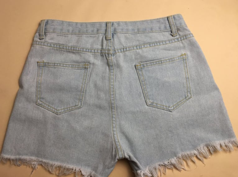 Shorts vaqueros de cintura alta con borlas y rotos para mujer