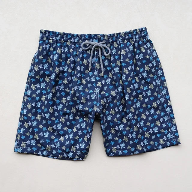 https://ae01.alicdn.com/kf/Sd7aa97336ad94f0b8fccbcd2ddab158bP/High-Quality-Summer-New-Styley-Beach-Surf-Swimwear-Multicolore-Turtles-4-Way-Stretch-Printed-Board-Shorts.jpg_640x640.jpg