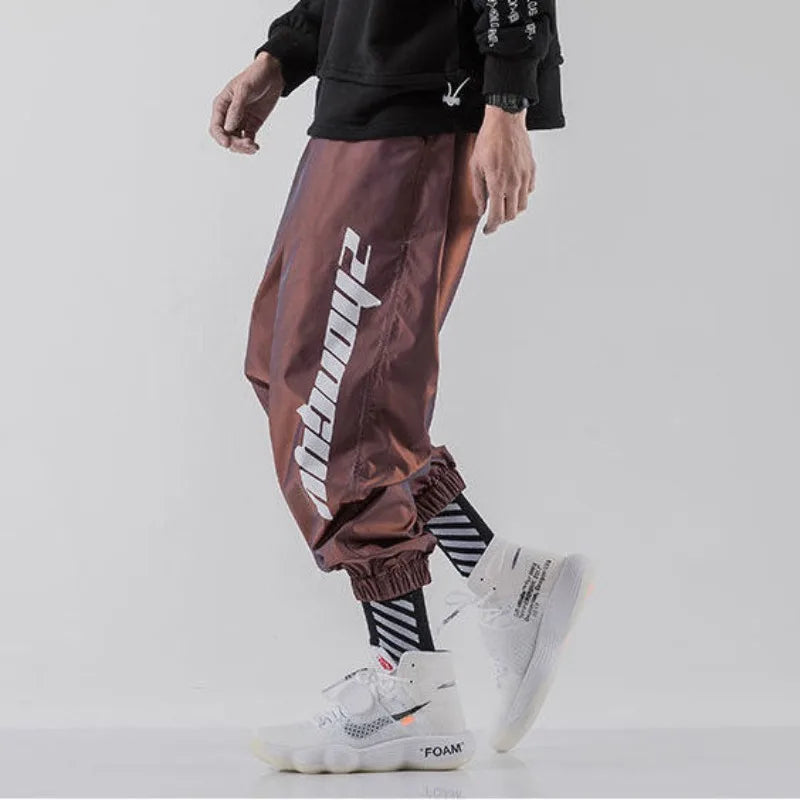 https://ae01.alicdn.com/kf/Sa5cd4cef7249407faef56d17aef551453/Hip-Hop-Trendy-Men-Casual-Reflective-Sweatpants-Spring-Autumn-Korean-Streetwear-Fashion-New-Baggy-Elastic-Waist.jpg