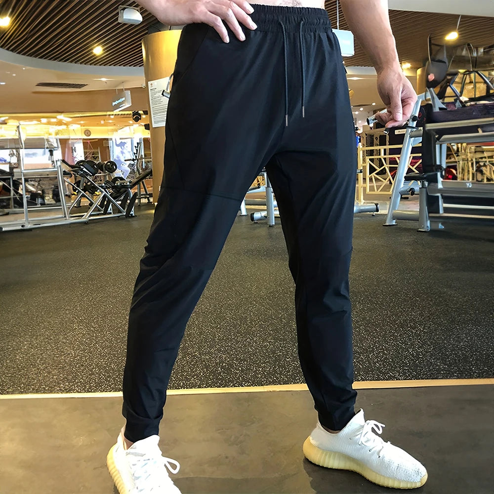 https://ae01.alicdn.com/kf/S8b029472487741a0b94d96aa163af286l/Men-s-Pants-Summer-Thin-Sports-Casual-Pants-Harajuku-Streetwear-Fitness-Jogging-Outdoor-Running-Training-Sweatpants.jpg