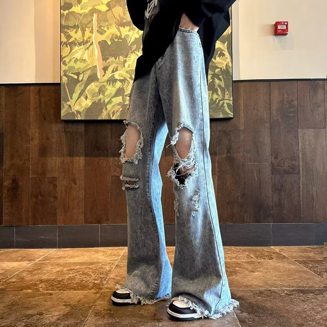 Vaqueros viejos rotos y lavados con copos de nieve de estilo americano