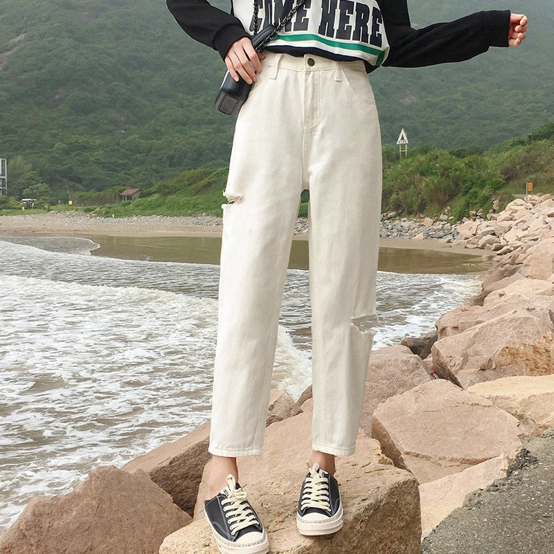 Jeans rectos de tubo con nueve aberturas y rotos