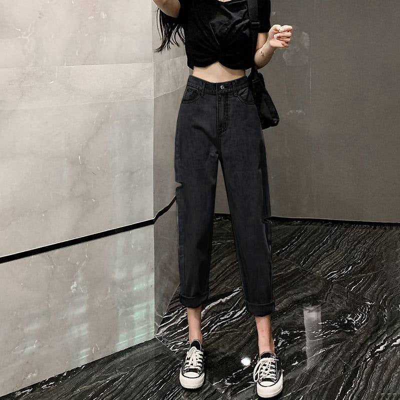 Jeans rectos de tubo con nueve aberturas y rotos