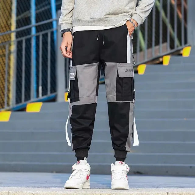 https://ae01.alicdn.com/kf/Ha3d29f1bca4942f6a3bf99c062b1cb5ac/Ribbons-Harem-Joggers-Men-Cargo-Pants-Streetwear-2023-Hip-Hop-Casual-Pockets-Track-Pants-Male-Harajuku.jpg_640x640.jpg