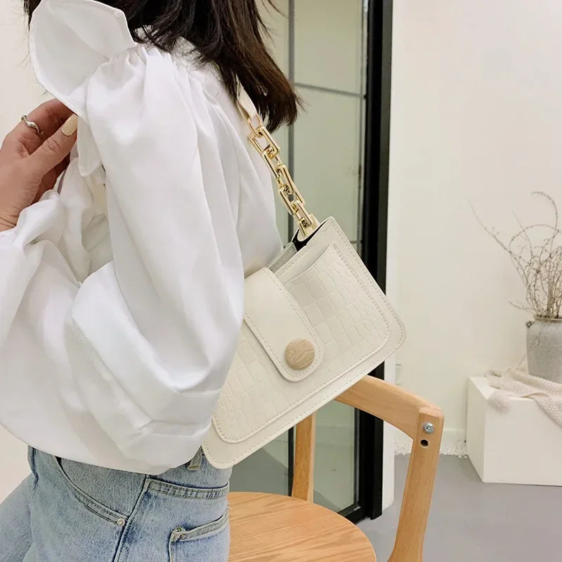 https://ae01.alicdn.com/kf/S01e4d23b26af4b4887c4ed87e69d1eeb3/Stone-Pattern-Wide-Shoulder-Strap-Small-Square-Bag-Retro-Fashion-Pu-Leather-Shoulder-Handbags-New-Underarm.jpg