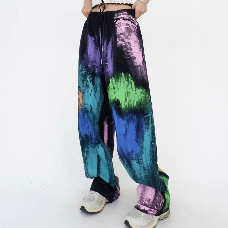 https://ae01.alicdn.com/kf/S82486e3454ac49958455890ef853410ee/Streetwear-Y2K-Graffiti-Color-Woman-Oversize-Pants-Spring-Summer-Pockets-Elastic-Waist-Hip-Hop-Sports-Casual.jpg