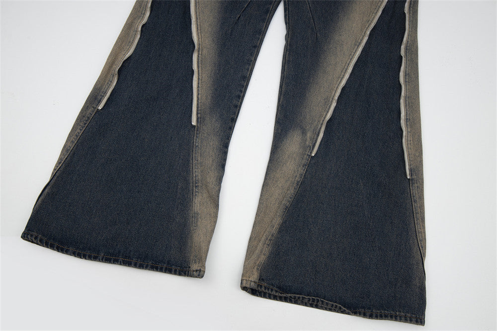 Diseño de cremallera con pintura en aerosol para jeans ligeramente acampanados para hombre