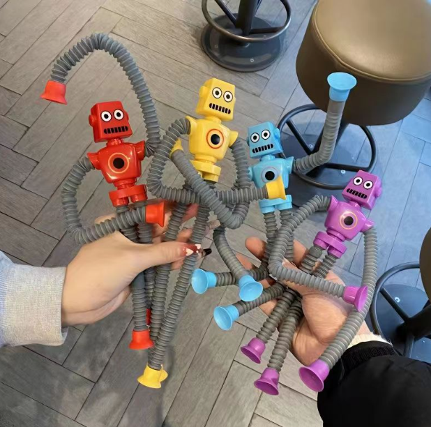 Kit con 4 Robótica - Lindos y coloridos robots de juguete estirables con ventosa