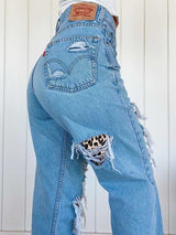 Jeans de mujer con estampado de leopardo roto