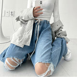 Pantalones holgados de cintura alta con lazo y rotos irregulares de hip hop para mujer
