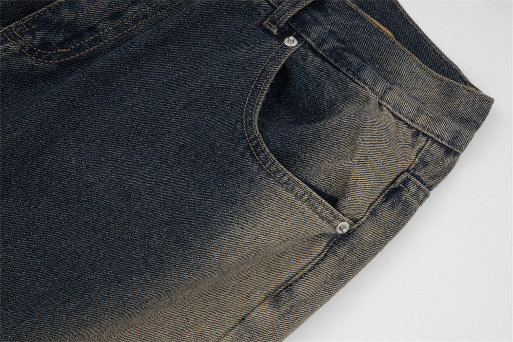 Diseño de cremallera con pintura en aerosol para jeans ligeramente acampanados para hombre