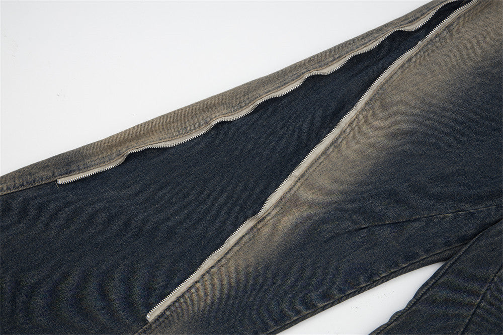 Diseño de cremallera con pintura en aerosol para jeans ligeramente acampanados para hombre