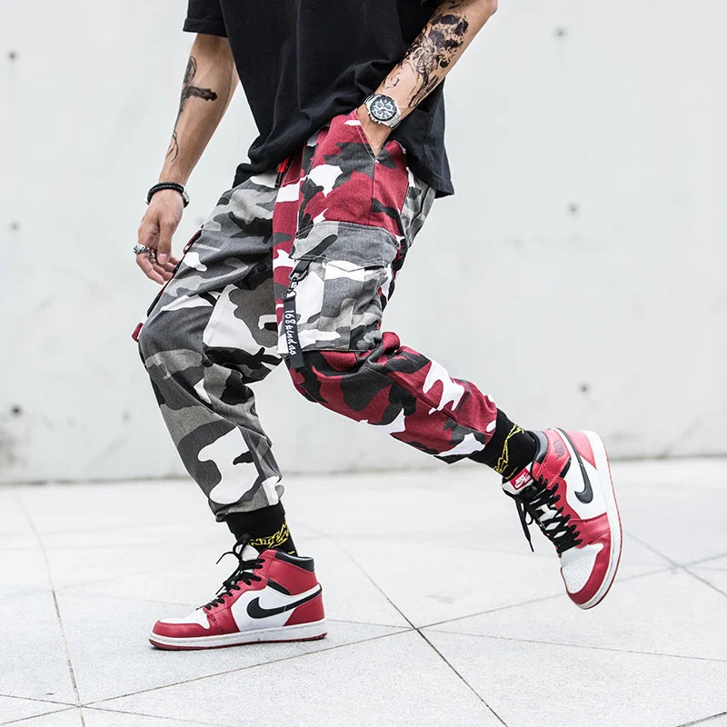 https://ae01.alicdn.com/kf/Hbba8777ebcae4e10b23647f070874e0e2/2020-Mens-Fashion-Splice-joggers-pants-hip-hop-Streetwear-Camo-pants-Cargo-pants-Men-Camo-Pants.jpg