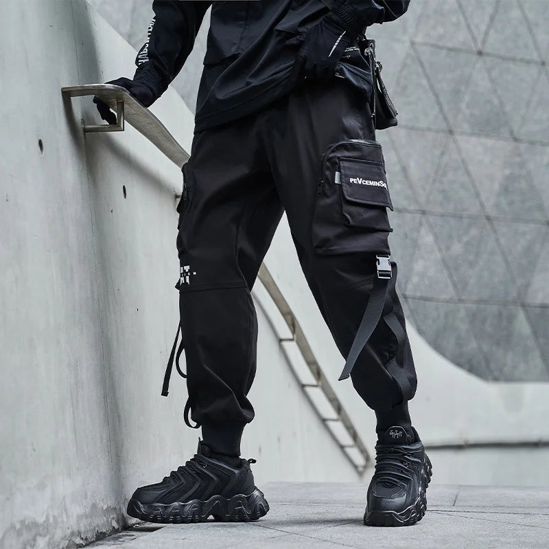 https://ae01.alicdn.com/kf/Hf81599145b9f42a2997393a33675f09bK/2021-New-Joggers-Cargo-Pants-Men-Fashion-Ribbons-Pocket-Harem-Trousers-Sweatpants-Men-Hip-Hop-Harajuku.jpg
