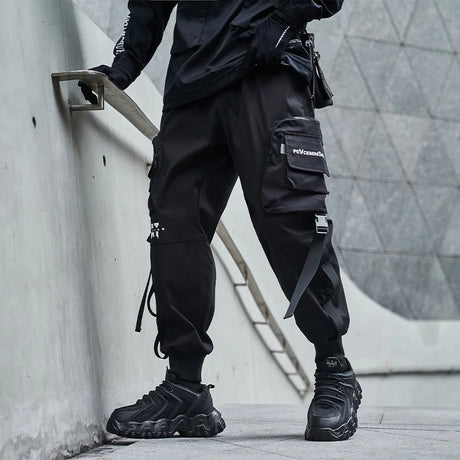 https://ae01.alicdn.com/kf/Hf81599145b9f42a2997393a33675f09bK/2021-New-Joggers-Cargo-Pants-Men-Fashion-Ribbons-Pocket-Harem-Trousers-Sweatpants-Men-Hip-Hop-Harajuku.jpg