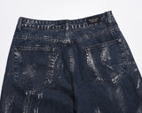 Vaqueros negros rotos con efecto lavado de High Street