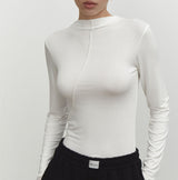 Camiseta de manga larga interior ajustada con diseño inclinado de moda de primavera y verano