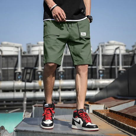 https://ae01.alicdn.com/kf/S55167971cd1046f1b0b702aeafa5b3f14/Erkekler-yaz-kargo-ort-2023-Streetwear-Masculino-Jogger-adam-Streetwear-ordu-ye-il-rahat-tulum.jpg_640x640.jpg