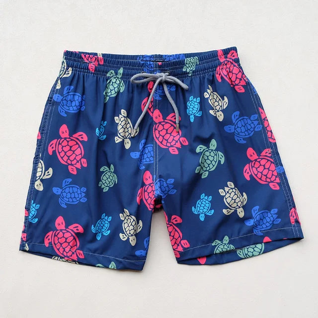 https://ae01.alicdn.com/kf/S2689877f1ec14c33a660fad486a845dc6/High-Quality-Summer-New-Styley-Beach-Surf-Swimwear-Multicolore-Turtles-4-Way-Stretch-Printed-Board-Shorts.jpg_640x640.jpg