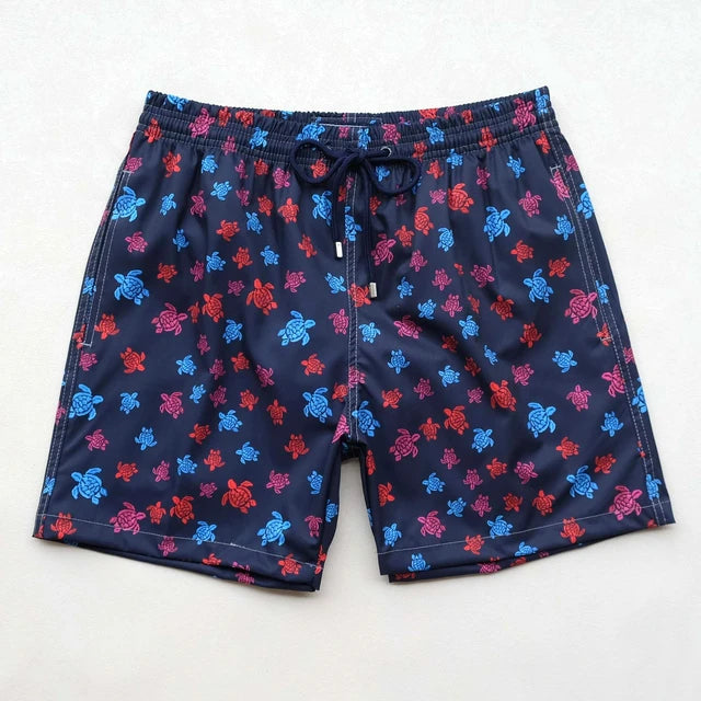 https://ae01.alicdn.com/kf/S3142e0fa72f14ad7ac7b36f3dcbb805ev/High-Quality-Summer-New-Styley-Beach-Surf-Swimwear-Multicolore-Turtles-4-Way-Stretch-Printed-Board-Shorts.jpg_640x640.jpg