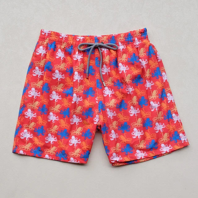 https://ae01.alicdn.com/kf/S6703568dc6ce47b9a14d5686bc241d1dB/High-Quality-Summer-New-Styley-Beach-Surf-Swimwear-Multicolore-Turtles-4-Way-Stretch-Printed-Board-Shorts.jpg_640x640.jpg
