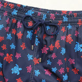 https://ae01.alicdn.com/kf/Sb2b4833ac913416ea6237aa5cba3bccaj/High-Quality-Summer-New-Styley-Beach-Surf-Swimwear-Multicolore-Turtles-4-Way-Stretch-Printed-Board-Shorts.jpg