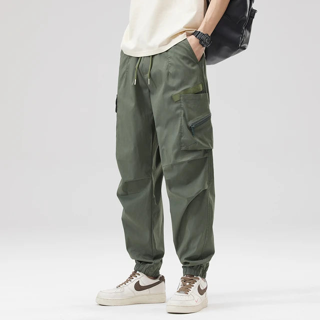 https://ae01.alicdn.com/kf/S5f19061dd689409abb8114bf97fa380fK/Hip-Hop-Streetwear-Cargo-Pants-Spring-Summer-Casual-Pans-Men-Streetwear-Solid-Color-Pants-Elastic-Waist.jpg_640x640.jpg