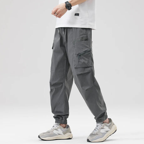 https://ae01.alicdn.com/kf/Sb4dcf84e2e93423f8f57fbb7ac1aa8b2z/Hip-Hop-Streetwear-Cargo-Pants-Spring-Summer-Casual-Pans-Men-Streetwear-Solid-Color-Pants-Elastic-Waist.jpg