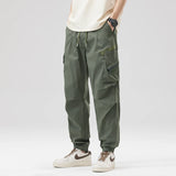 https://ae01.alicdn.com/kf/S5ea3861aa8ba43af904017cc3f24ac920/Hip-Hop-Streetwear-Cargo-Pants-Spring-Summer-Casual-Pans-Men-Streetwear-Solid-Color-Pants-Elastic-Waist.jpg