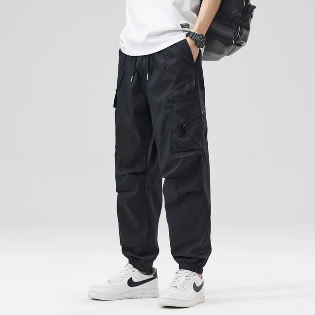 https://ae01.alicdn.com/kf/S1e58dc76e7e849dd885faff6272d2d84V/Hip-Hop-Streetwear-Cargo-Pants-Spring-Summer-Casual-Pans-Men-Streetwear-Solid-Color-Pants-Elastic-Waist.jpg
