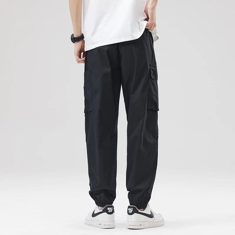https://ae01.alicdn.com/kf/Sa436ad3eedc6477b8ba581c43b950c3b7/Hip-Hop-Streetwear-Cargo-Pants-Spring-Summer-Casual-Pans-Men-Streetwear-Solid-Color-Pants-Elastic-Waist.jpg