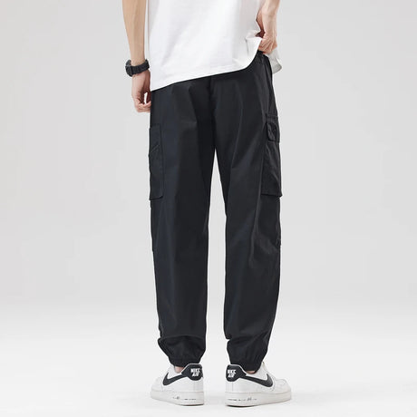 https://ae01.alicdn.com/kf/Sa436ad3eedc6477b8ba581c43b950c3b7/Hip-Hop-Streetwear-Cargo-Pants-Spring-Summer-Casual-Pans-Men-Streetwear-Solid-Color-Pants-Elastic-Waist.jpg