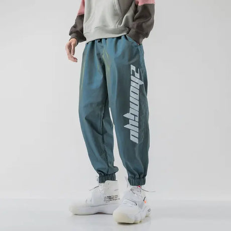 https://ae01.alicdn.com/kf/Sb26021935cbf4a36aac500a5672c24a3E/Hip-Hop-Trendy-Men-Casual-Reflective-Sweatpants-Spring-Autumn-Korean-Streetwear-Fashion-New-Baggy-Elastic-Waist.jpg_640x640.jpg