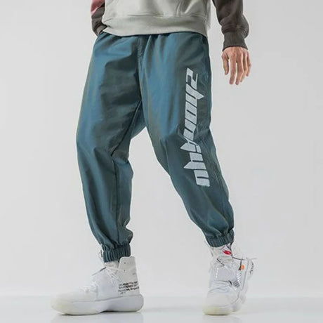 https://ae01.alicdn.com/kf/S0905ea0261214dd8855cb5f4770e3b252/Hip-Hop-Trendy-Men-Casual-Reflective-Sweatpants-Spring-Autumn-Korean-Streetwear-Fashion-New-Baggy-Elastic-Waist.jpg