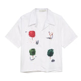 Camisa informal de manga corta con cuello solapa y estampado de dibujos