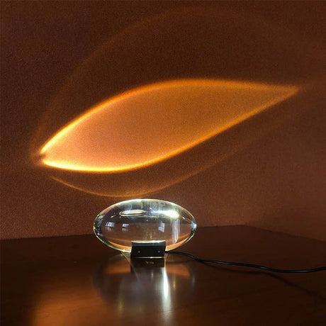 https://ae01.alicdn.com/kf/S5e78e83754e2415485387bed2d975e4ay/Italian-Designer-Table-Lamp-Led-Crystal-Eye-Of-The-Sky-Bedside-Table-Lamps-For-Living-Bedroom.jpg