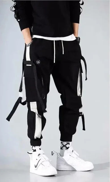 https://ae01.alicdn.com/kf/Sd9f4d16492d74cb6bd56022d4897c2b4K/Joggers-Cargo-Pants-for-Men-Casual-Hip-Hop-Hit-Color-Pocket-Male-Trousers-Sweatpants-Streetwear-Ribbons.jpg_640x640.jpg