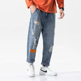 https://ae01.alicdn.com/kf/Haa32d2983f72454b9f7ff7a9e43394222/Kx-8801-moda-kentsel-erkekler-delik-kot-Hip-Hop-moda-Streetwear-gev-ek-t-m-ma.jpg