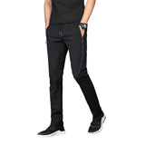 https://ae01.alicdn.com/kf/Sef561cf3e3e94a7ba26249082fb3b47cg/Men-S-Zipper-Dry-Quick-Leisure-Pants-Mid-Waist-Casual-Versatile-Trend-Slim-Sports-Loose-Pants.jpg_640x640.jpg