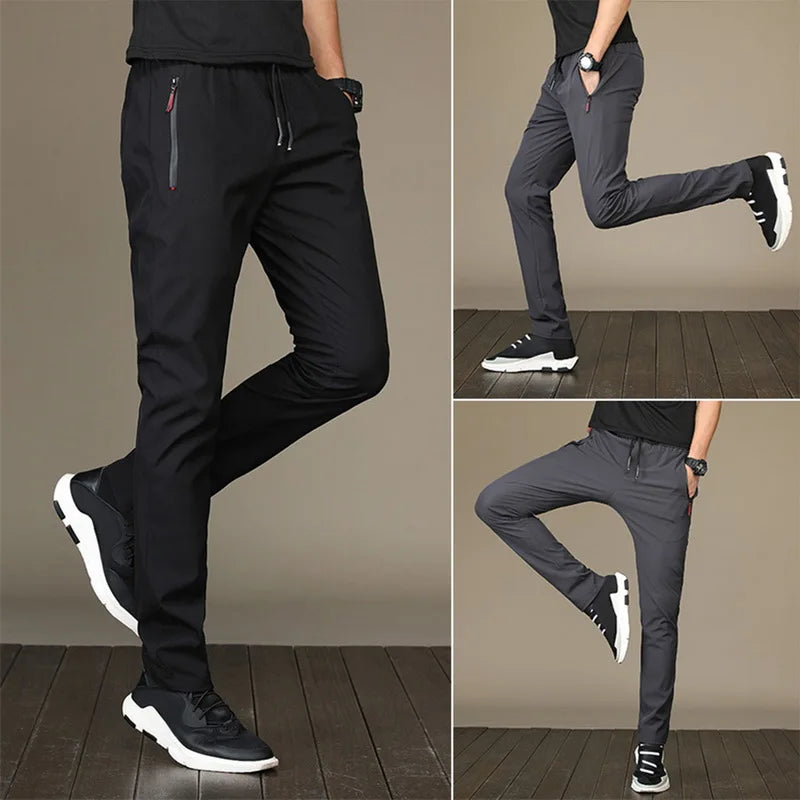 https://ae01.alicdn.com/kf/Sdc0b4117ef9741399f0dc61b5cd88eb0g/Men-S-Zipper-Dry-Quick-Leisure-Pants-Mid-Waist-Casual-Versatile-Trend-Slim-Sports-Loose-Pants.jpg