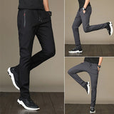 https://ae01.alicdn.com/kf/Sdc0b4117ef9741399f0dc61b5cd88eb0g/Men-S-Zipper-Dry-Quick-Leisure-Pants-Mid-Waist-Casual-Versatile-Trend-Slim-Sports-Loose-Pants.jpg