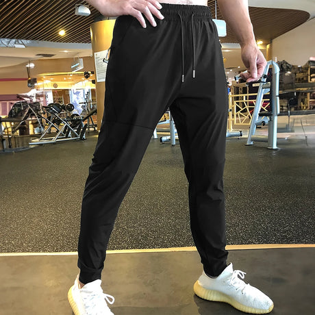 https://ae01.alicdn.com/kf/Sc7882cc501c74cdcbfdb9bd662a60bd59/Men-s-Pants-Summer-Thin-Sports-Casual-Pants-Harajuku-Streetwear-Fitness-Jogging-Outdoor-Running-Training-Sweatpants.jpg