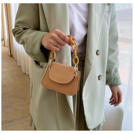 https://ae01.alicdn.com/kf/S8bc94042deca4d678a49ef12f107e53dh/Mini-Crossbody-Coin-Purse-Fashion-Mini-Handbags-Pure-Pattern-Pearl-Handbag-Plastic-Small-Chain-Jelly-Bag.jpg