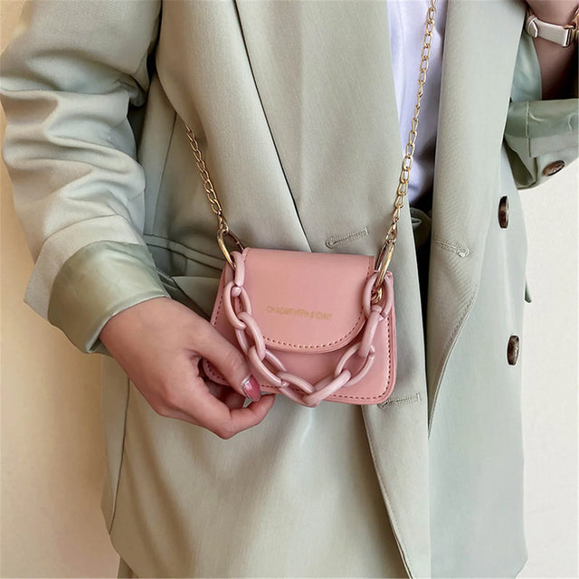 https://ae01.alicdn.com/kf/S3127e83fa9f9466881bcab944a9a0018Q/Mini-Crossbody-Coin-Purse-Fashion-Mini-Handbags-Pure-Pattern-Pearl-Handbag-Plastic-Small-Chain-Jelly-Bag.jpg