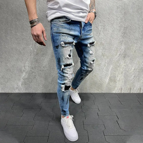 https://ae01.alicdn.com/kf/S2f0b3dfc4b984c7696c1ccddd3a2d097t/New-Fashion-Design-Hole-Slim-Jeans-Men-s-Paint-Ripped-Stitching-Skinny-Denim-Pants-Casual-Hollow.jpg