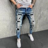 https://ae01.alicdn.com/kf/S8796bf0115e74ea38fffb07576567051c/New-Fashion-Design-Hole-Slim-Jeans-Men-s-Paint-Ripped-Stitching-Skinny-Denim-Pants-Casual-Hollow.jpg