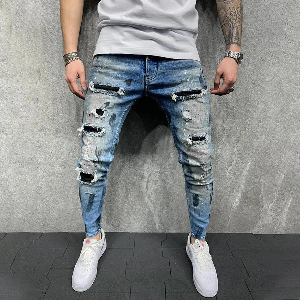 https://ae01.alicdn.com/kf/Sdb73ae67cfc04b839022bab38b7bb70fA/New-Fashion-Design-Hole-Slim-Jeans-Men-s-Paint-Ripped-Stitching-Skinny-Denim-Pants-Casual-Hollow.jpg