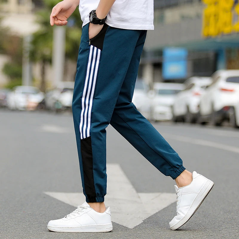 https://ae01.alicdn.com/kf/S85a1300260754b028f458c7bd18c3a47F/New-Men-s-Autumn-and-Winter-Casual-Color-Matching-Trousers-Korean-Style-Clothes-Fashionable-Sports-and.jpg