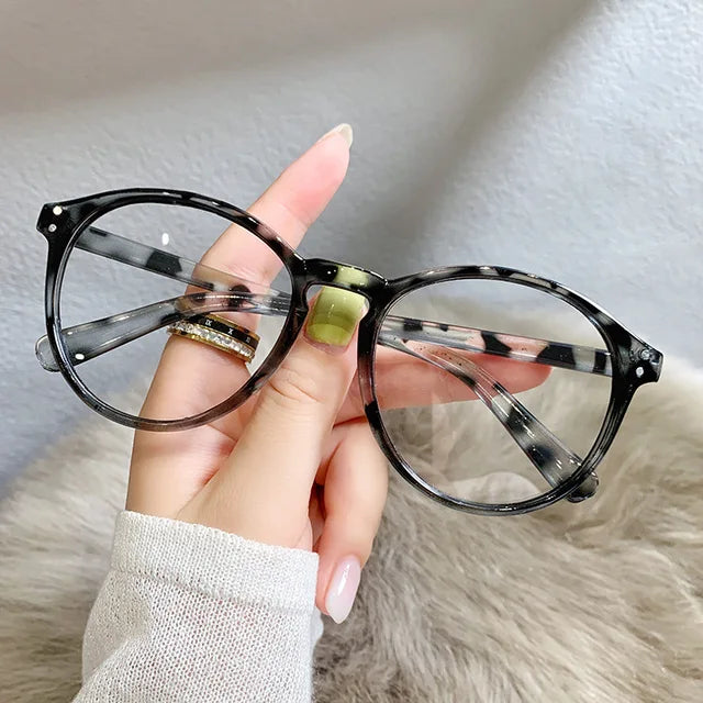 https://ae01.alicdn.com/kf/Sa13bf11e2d1d4376bd65a3d1558fd6daV/New-Style-Anti-blue-Light-Myopia-Glasses-Men-Women-Luxury-Desgin-Round-Small-Frame-Eyewear-Optical.jpg_640x640.jpg