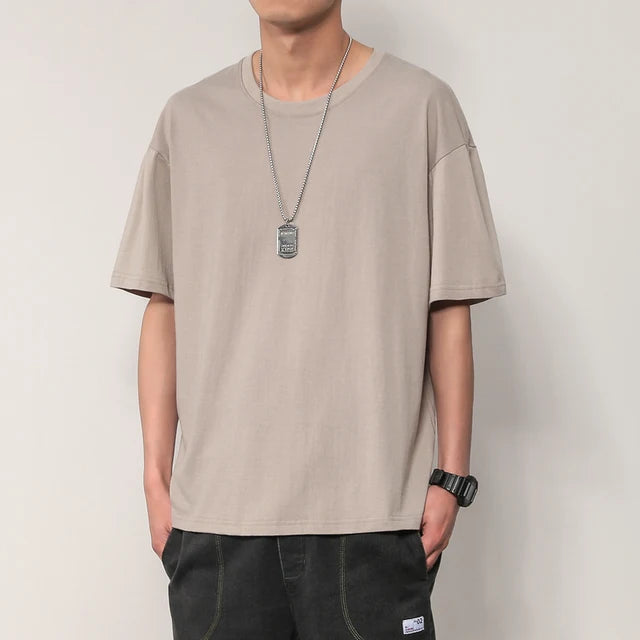 https://ae01.alicdn.com/kf/S87a8cdb4dc7a4afeb8daaf6e3bb64349D/New-short-sleeve-t-shirt-men-s-summer-trend-couple-outfit-solid-color-base-solid-color.jpg_640x640.jpg